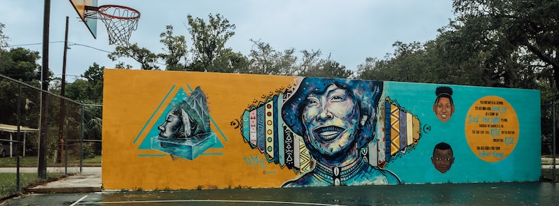 Portrait of Zora Neale Hurston as part of Art of Collab's Eatonville mural.