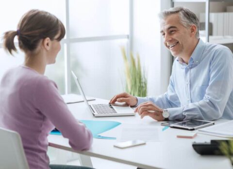 Advisor meeting happy client