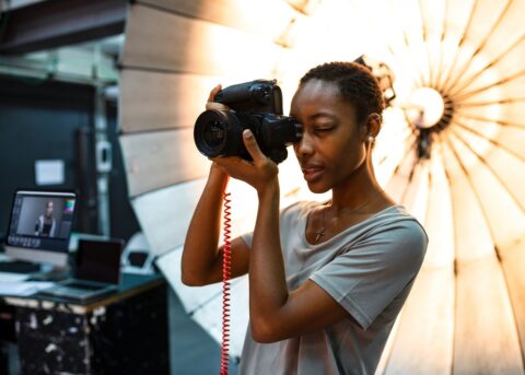 Freelance photographer working on a fashion shoot.
