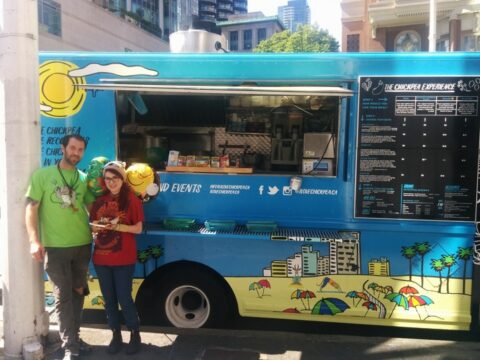 Rotem Tal and his sister in front of the food truck he owned before joining Melio.