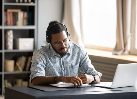 Small business owner reviewing his business plan.