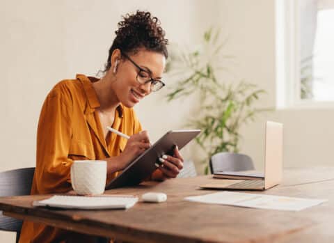An accountant discussing a financial report with a client over the phone.