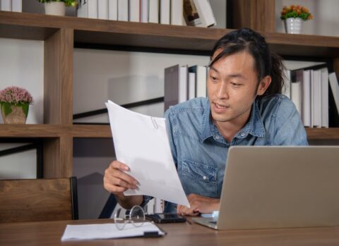 A small business owner managing invoices.