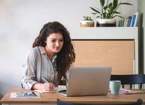 A small business owner processing invoices.