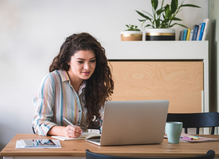 A small business owner processing invoices.