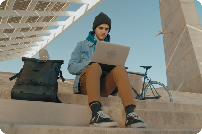 A freelancer works from a laptop.