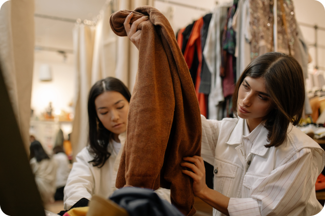 Two business owners at a retail store.