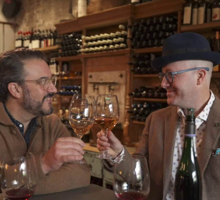 André Tamers, founder of De Maison East and Ryan Looper, director od De Maison East drinking wine