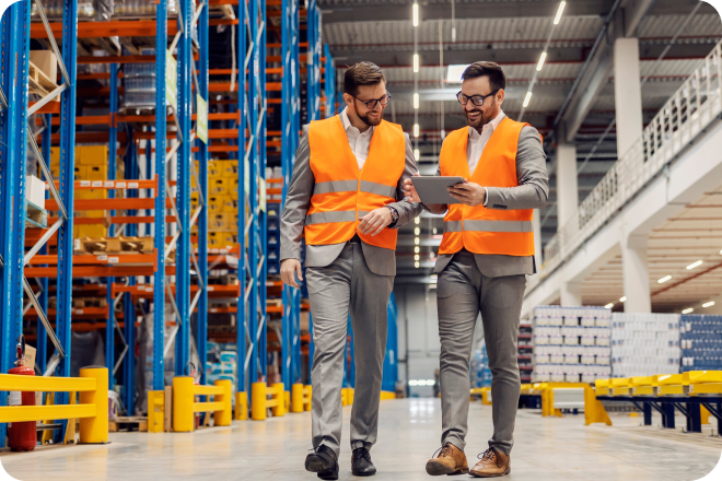 Wholesalers managing their business at a warehouse.