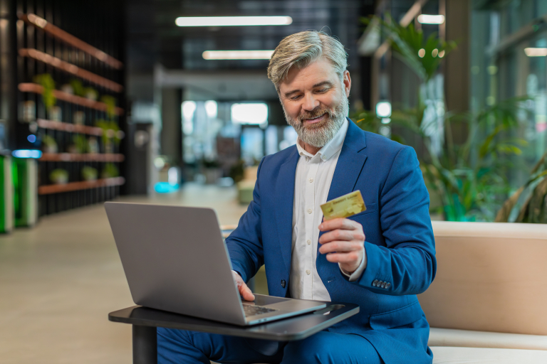 Business owner using credit card for strategic payment funding, managing accounts payable and cash flow with digital payment platform